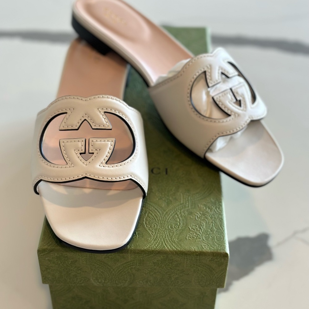 Gucci
Sexy GG Cut-Out Leather Slides - 41